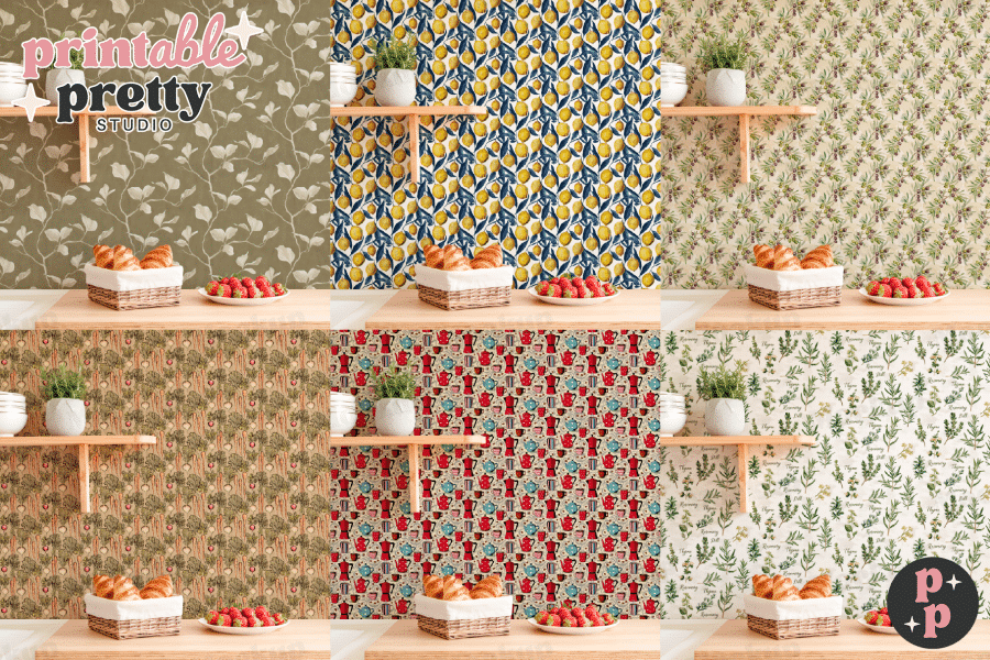 A kitchen counter displays various patterned wallpaper samples, each featuring a different design: lemons, olives, vegetables, and coffee pots.  Each sample is accompanied by croissants and strawberries.