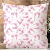 White Pillow With A Repeating Pattern Of Pink Baby Footprints.