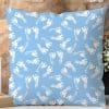 Light Blue Square Pillow With A Pattern Of White Baby Footprints.