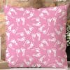 Pink Square Pillow With A Pattern Of White Baby Footprints.