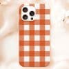 Iphone Case With Orange And White Gingham Pattern.