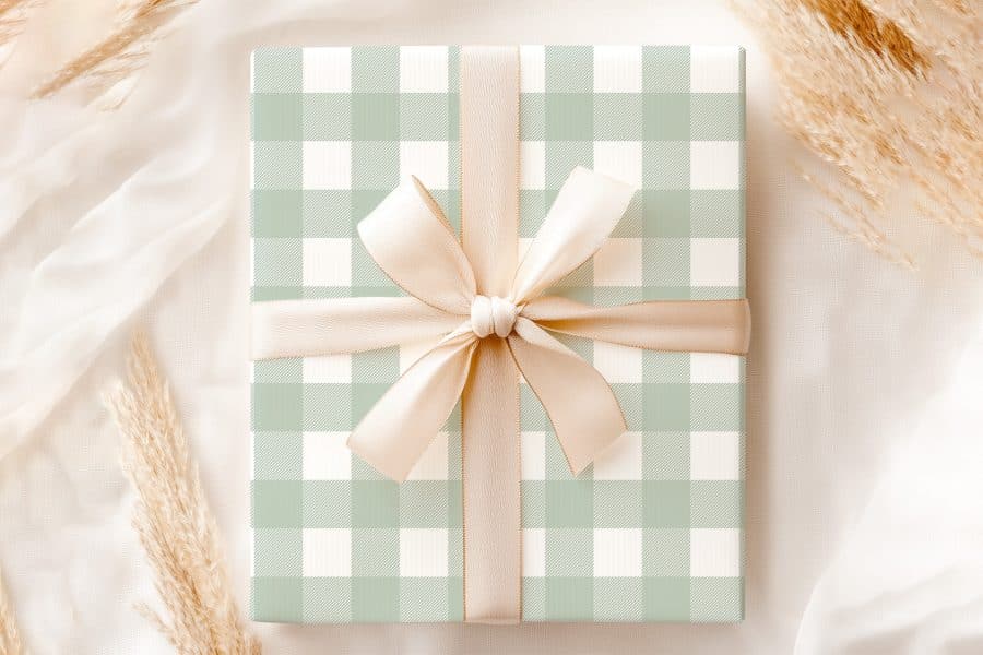 Sage Green And White Gingham Gift Box With A Beige Ribbon.