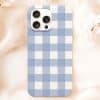 Phone Case With Light Blue And White Gingham Pattern.