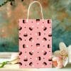 Pink Halloween Gift Bag With Candy Corn Pattern.