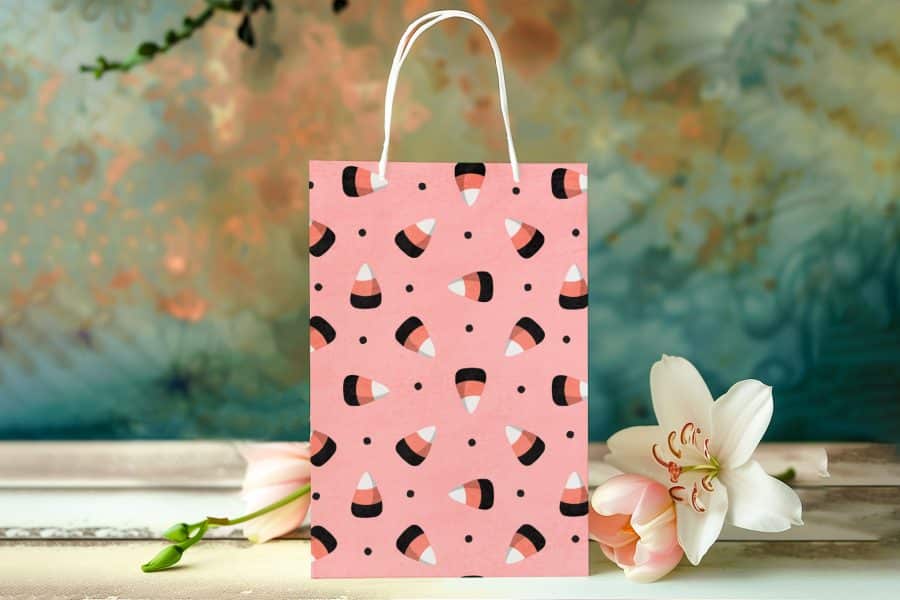 Pink Halloween Gift Bag With Candy Corn Pattern.