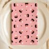 Pink Napkin With A Repeating Pattern Of Candy Corn.