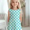 Young Girl Wearing A Teal And White Checkered Dress.