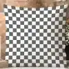 Checkered Throw Pillow With Dark Gray And White Squares.