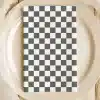 Checkered Napkin On A Beige Plate.