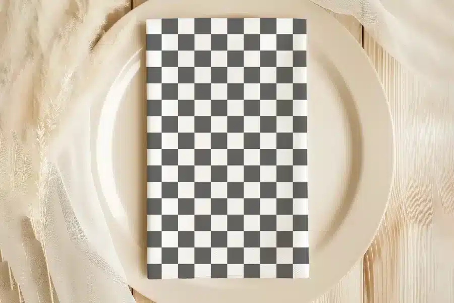 Checkered Napkin On A Beige Plate.