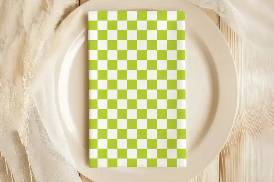 Lime Green And White Checkered Napkin On A Beige Plate.