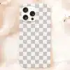 White Phone Case With A Gray Checkered Pattern And A Triple-Lens Camera.