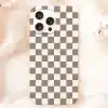 White Phone Case With A Brown And White Checkered Pattern.