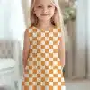 Girl Wearing An Orange And White Checkered Dress.