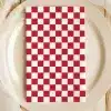 Red And White Checkered Napkin On A Plate.