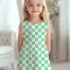Young Girl Wearing A Mint Green And White Checkered Dress.