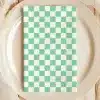 Mint Green And White Checkered Napkin On A Beige Plate.