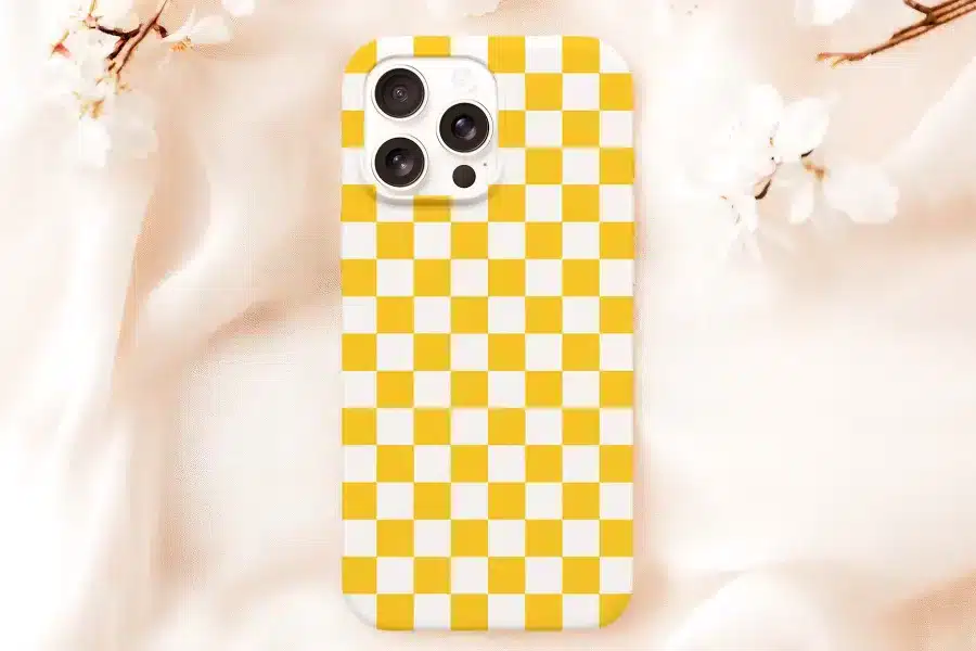 Phone Case With Yellow And White Checkered Pattern.