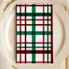 Plaid Napkin On A White Plate.
