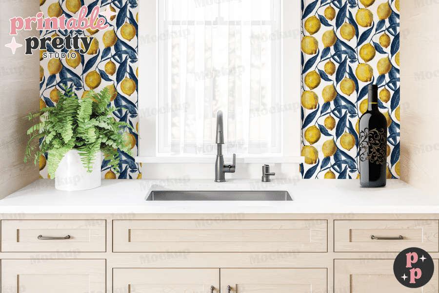 Kitchen Sink And Countertop With Lemon-Patterned Wallpaper.