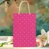 Pink Polka Dot Shopping Bag With White Handles.