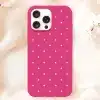 Pink Phone Case With White Polka Dots.