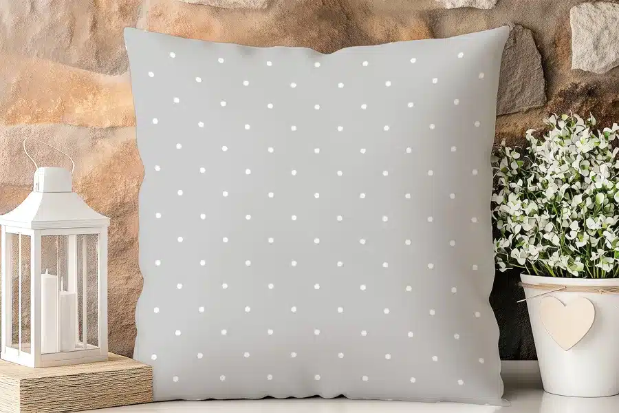 Grey Square Pillow With Small White Polka Dots.
