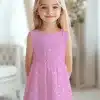 Girl Wearing A Pink Polka Dot Dress.