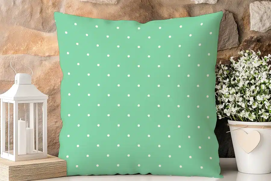 Mint Green Pillow With White Polka Dots.