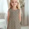 Girl In Taupe Polka Dot Dress.