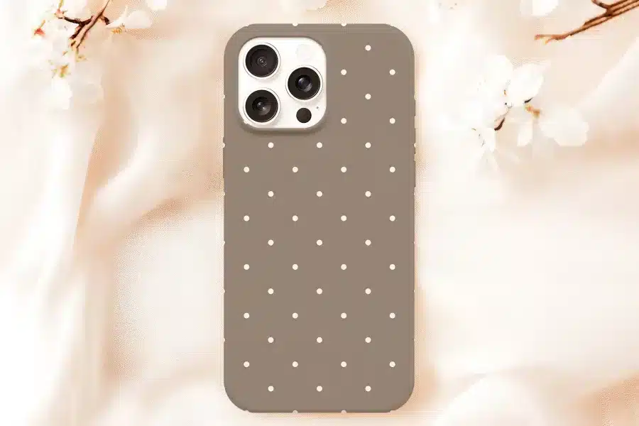 A Taupe Phone Case With White Polka Dots.