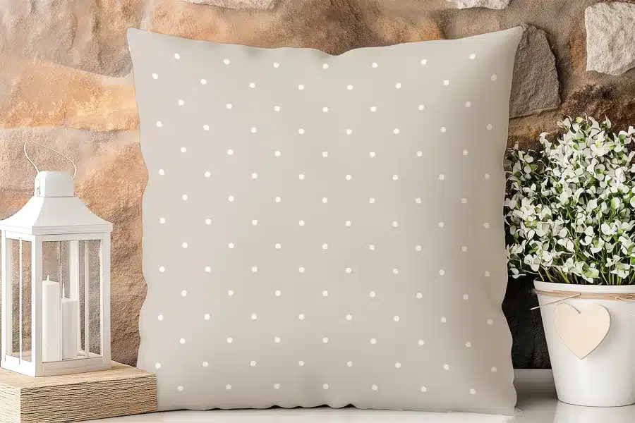 Beige Pillow With White Polka Dots.