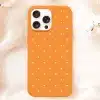 Orange Phone Case With White Polka Dots.