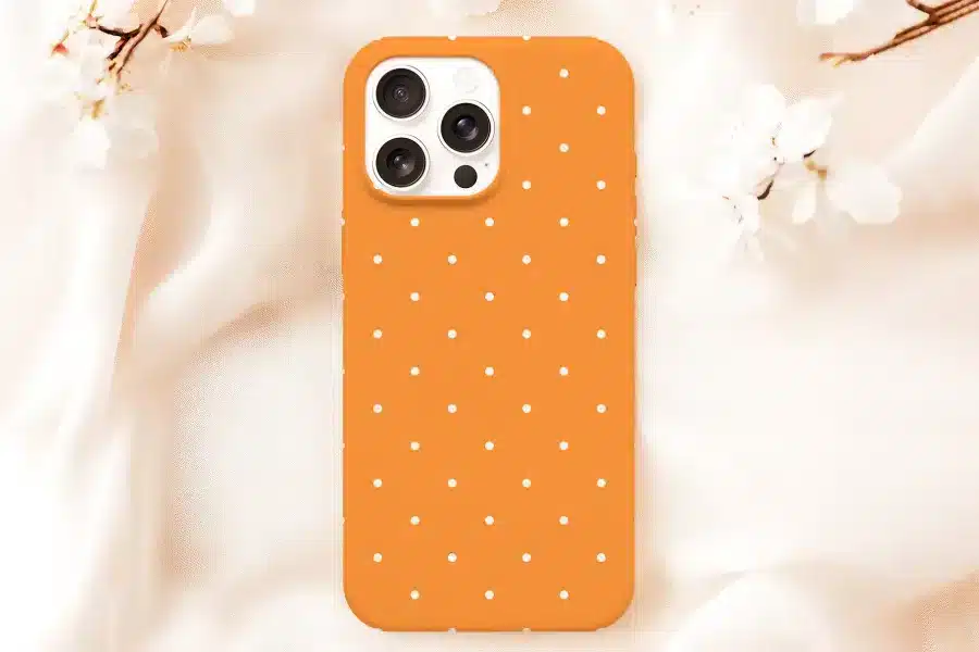 Orange Phone Case With White Polka Dots.