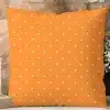 Orange Pillow With White Polka Dots.