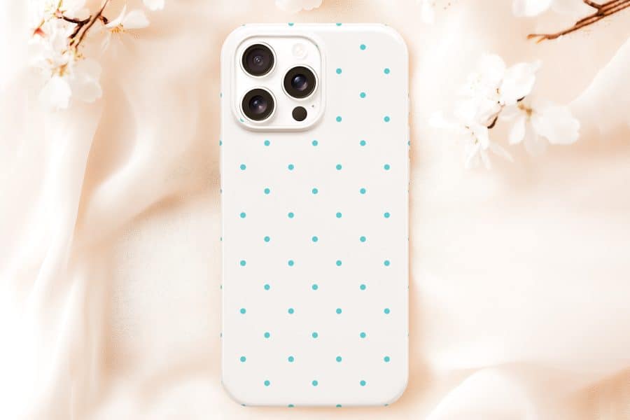 White Phone Case With Light Teal Polka Dots.