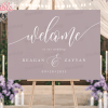 Lavender Wedding Welcome Sign With The Couple'S Names And Date.