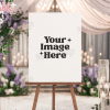 Blank Sign On Easel In Front Of Wedding Decorations.