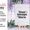 Blank Wedding Table Number Mockup Template On A Small Easel, Surrounded By Flowers.