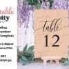 Peach-Colored Wedding Table Number Card, Number Twelve, On A Small Wooden Easel.