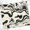 Abstract Black And Cream Swirled Pattern.