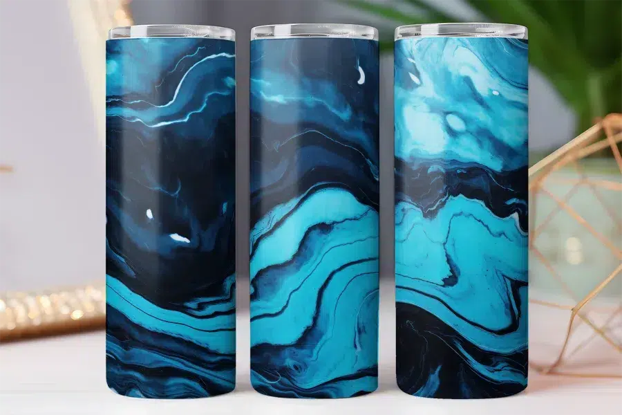 Three tumblers with a blue and black marbled design.