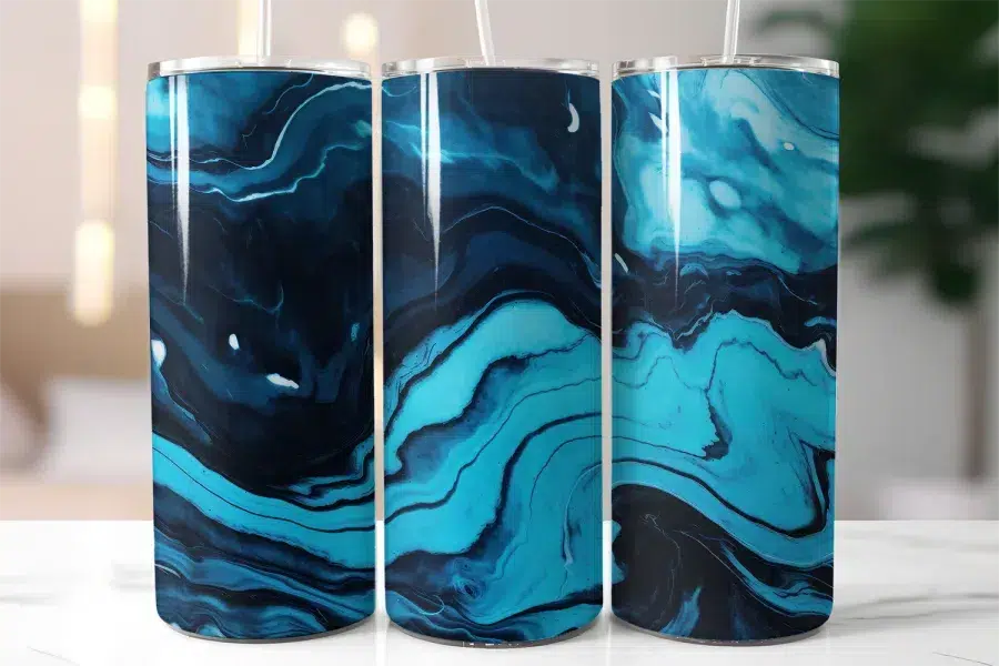 Three Tumblers With Blue And Black Marble Designs.