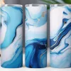 Three Blue And Gold Marble Patterned Tumblers.