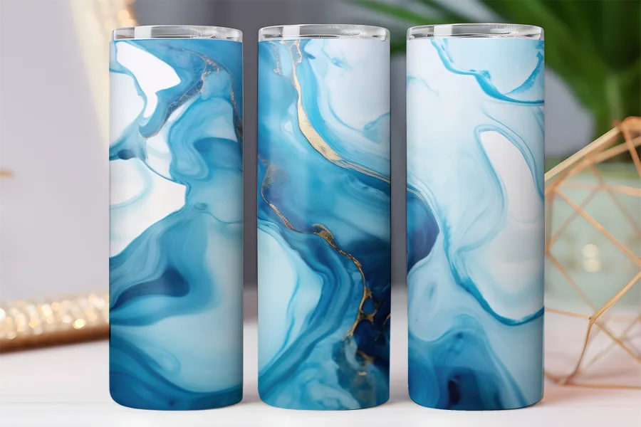 Three tumblers with a blue and gold marble design.