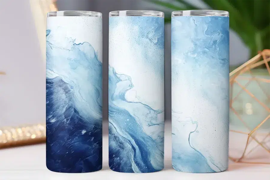 Three tall tumblers with a blue marble design.