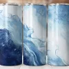 Three Tumblers With A Blue And White Marble Design.