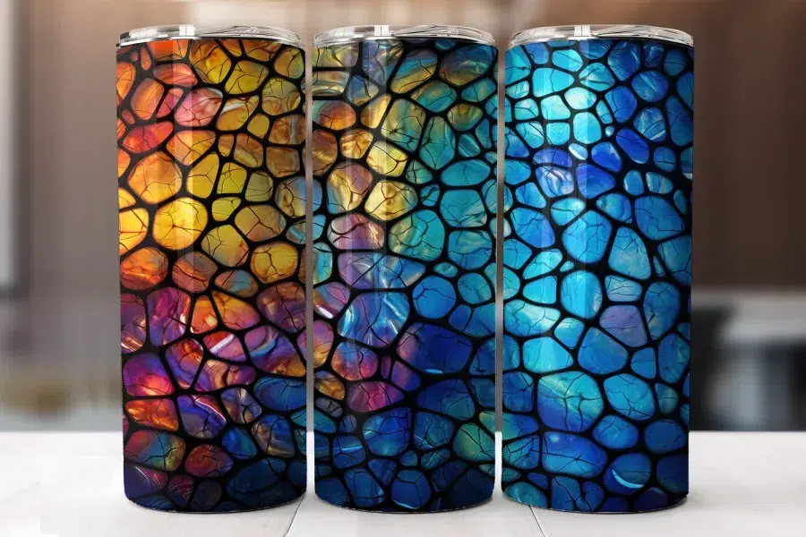 Three Colorful Tumblers With A Stained-Glass Mosaic Design.