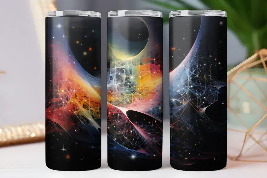Three tumblers with a colorful nebula design on a black background.