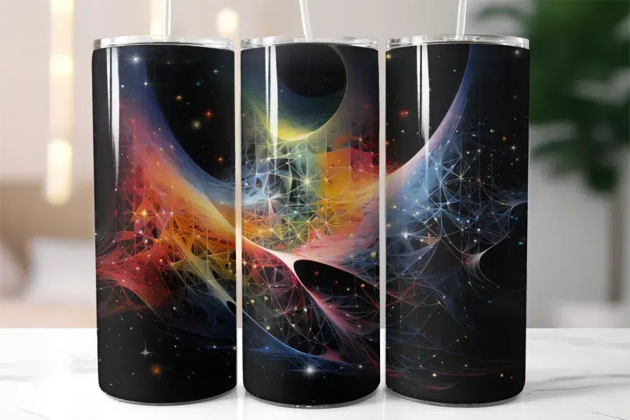 Three Stainless Steel Tumblers With Colorful Abstract Space Designs.